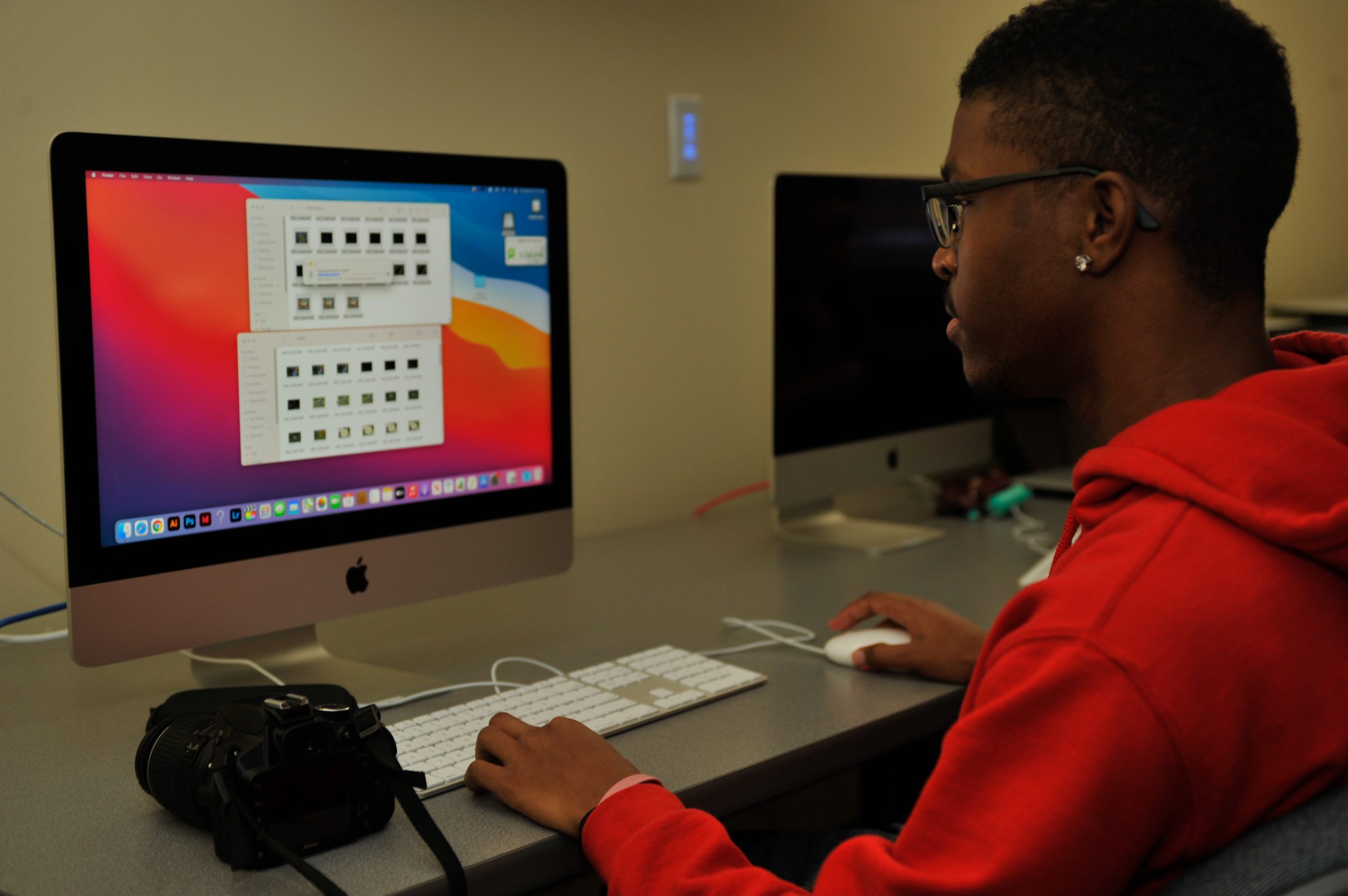 male student at desktop computer