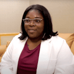 Nursing - Cydney Washington seated and smiling