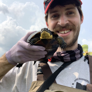 Jesse Sockman holding a turtle