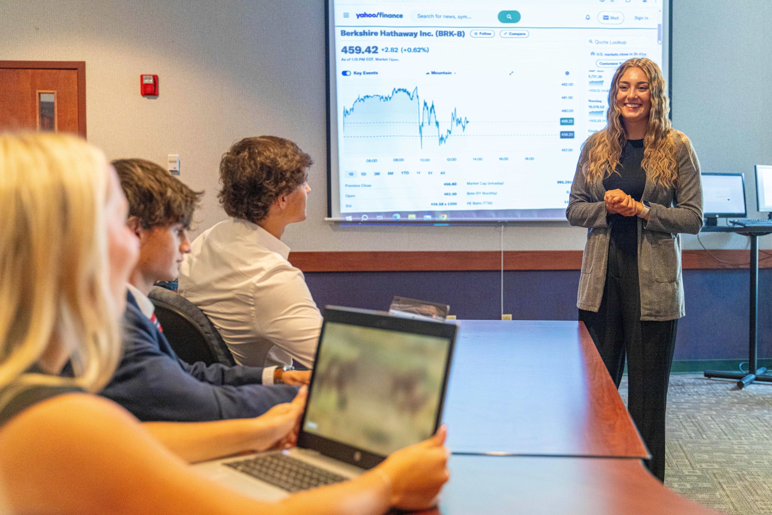 girl presenting in front of class
