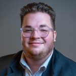 Headshot of John Evin