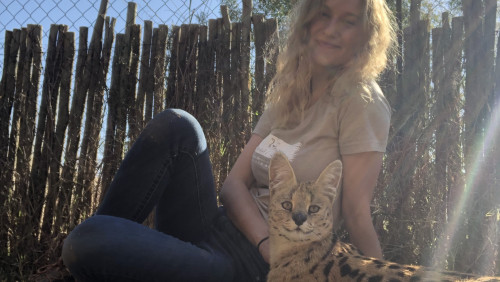 Jenna posing with pointy-eared cat