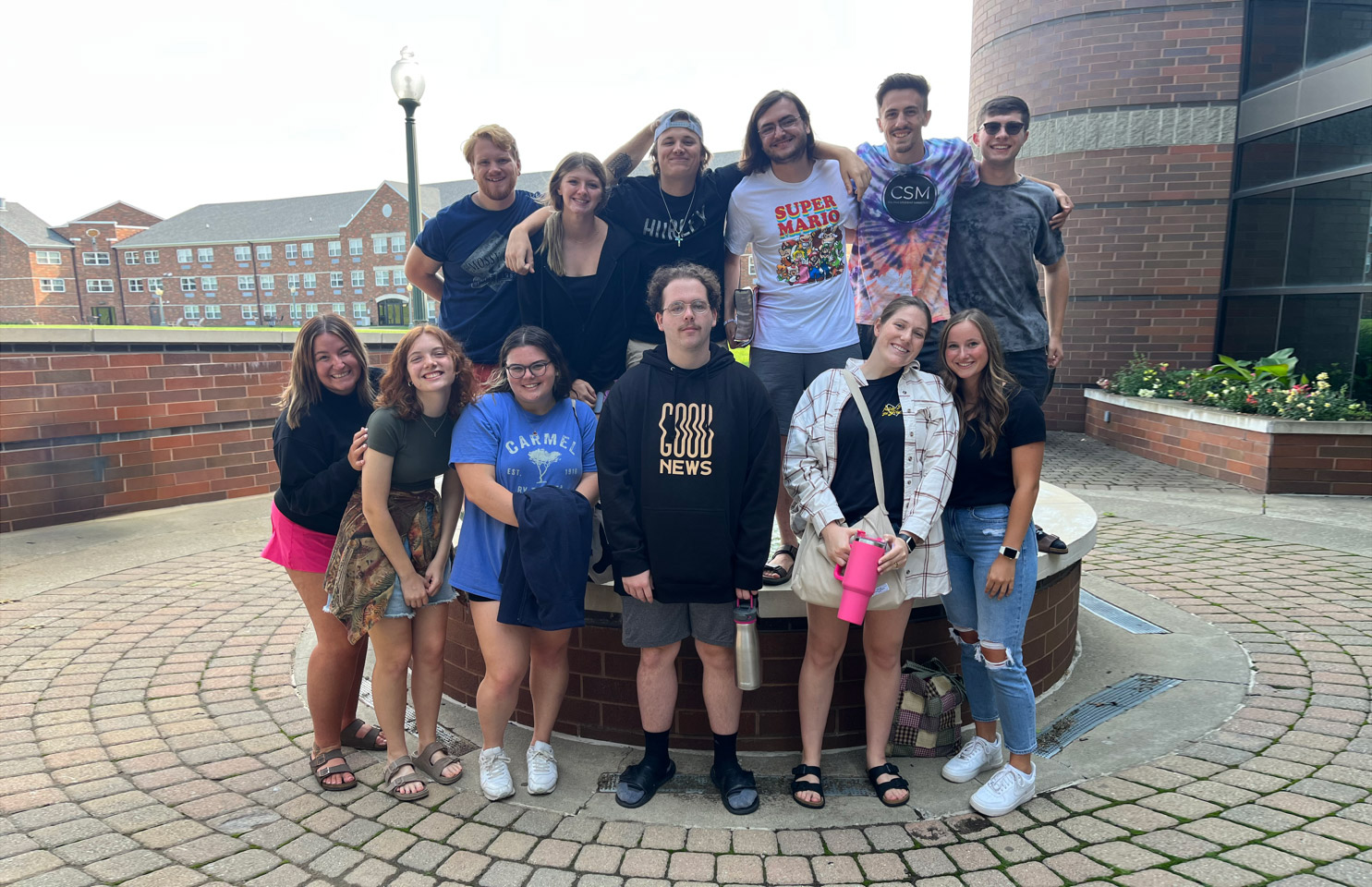 Large group of Malone students in a group outdoors on campus
