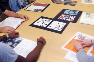 graphic art pieces on table